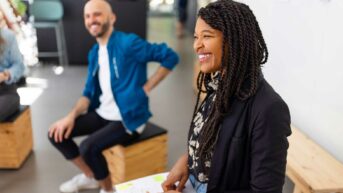 a man and woman sitting next to each other