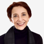 a woman wearing a black jacket and scarf