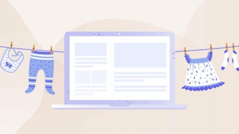 a laptop with clothes hanging on a line