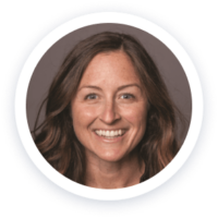 a smiling woman with long hair in a circle