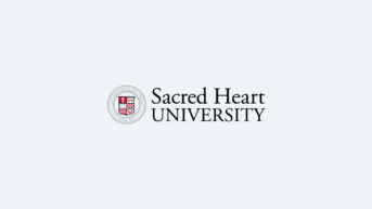 the sacred heart university logo on a white background