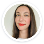 a woman with brown hair and orange lipstick