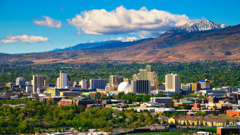 a city with mountains in the background
