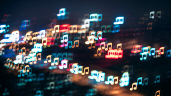 blurry image of city lights at night