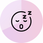 a purple circle with a black outline of a sleeping face