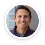 a man with a smile in a circle