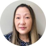 a woman with long hair in a circle