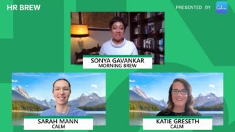 a group of people sitting next to each other