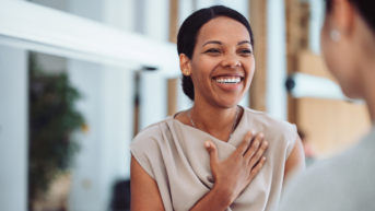 a woman showing gratitude