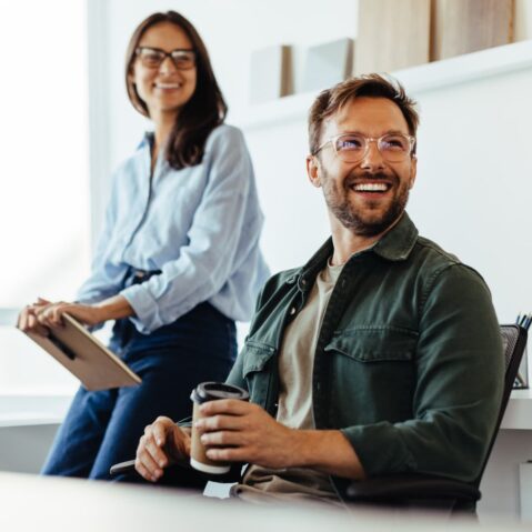 a man and a woman sitting at a table