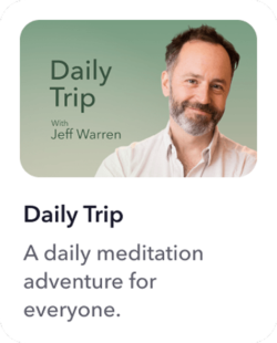 a man with a beard and a white shirt