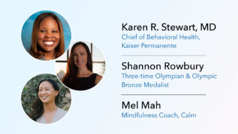 a group of four women smiling for the camera