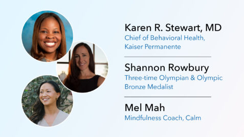 a group of four women smiling for the camera