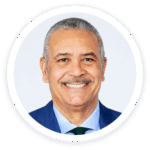 a man in a suit and tie is smiling