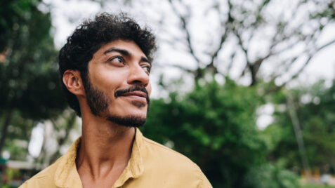 Hispanic man looking at sky, representing mental health of underserved populations